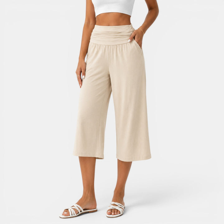 Pantalón capri de yoga elástico y transpirable para mujer. Ideal para fitness, deporte y actividad física.