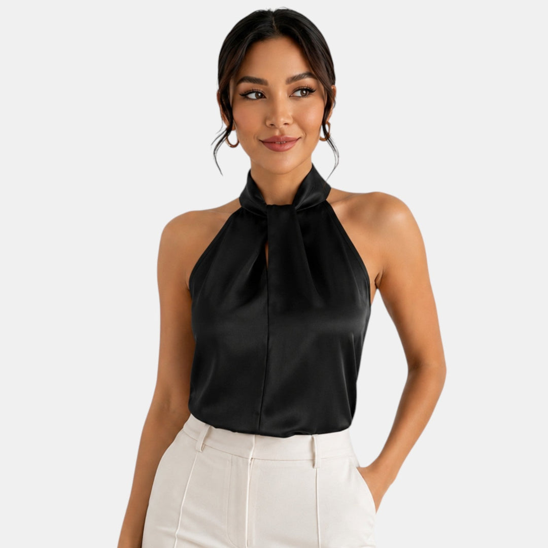 Top sin mangas elegante, perfecto para fiesta, look chic y llamativo.
