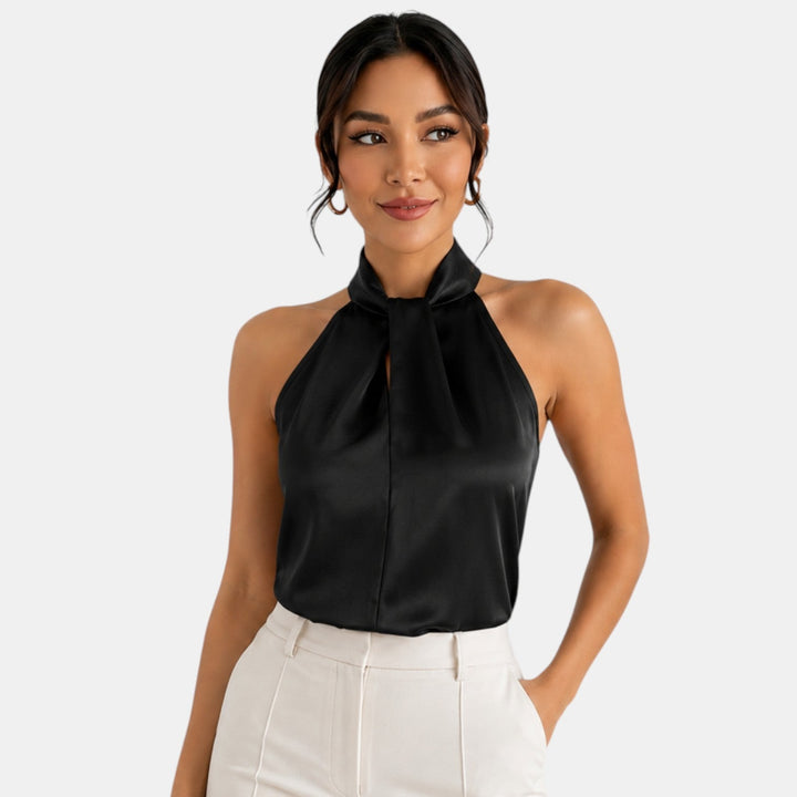 Top sin mangas elegante, perfecto para fiesta, look chic y llamativo.