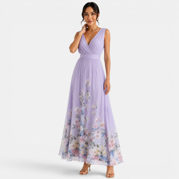 Vestido floral largo fluido para mujer, estilo versátil, perfecto para verano casual o fiesta.