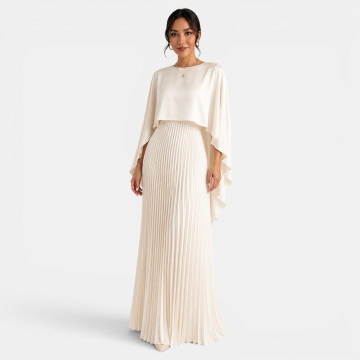 Vestido largo elegante para mujer con mangas murciélago y bajo asimétrico. Ideal para fiestas o casual.