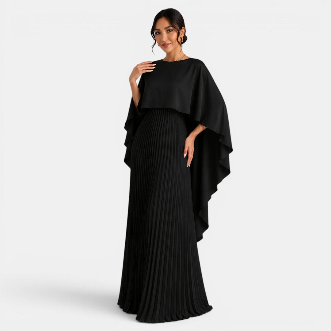 Vista trasera de un vestido largo casual para mujer, con distintivas mangas murciélago. Moda femenina versátil.