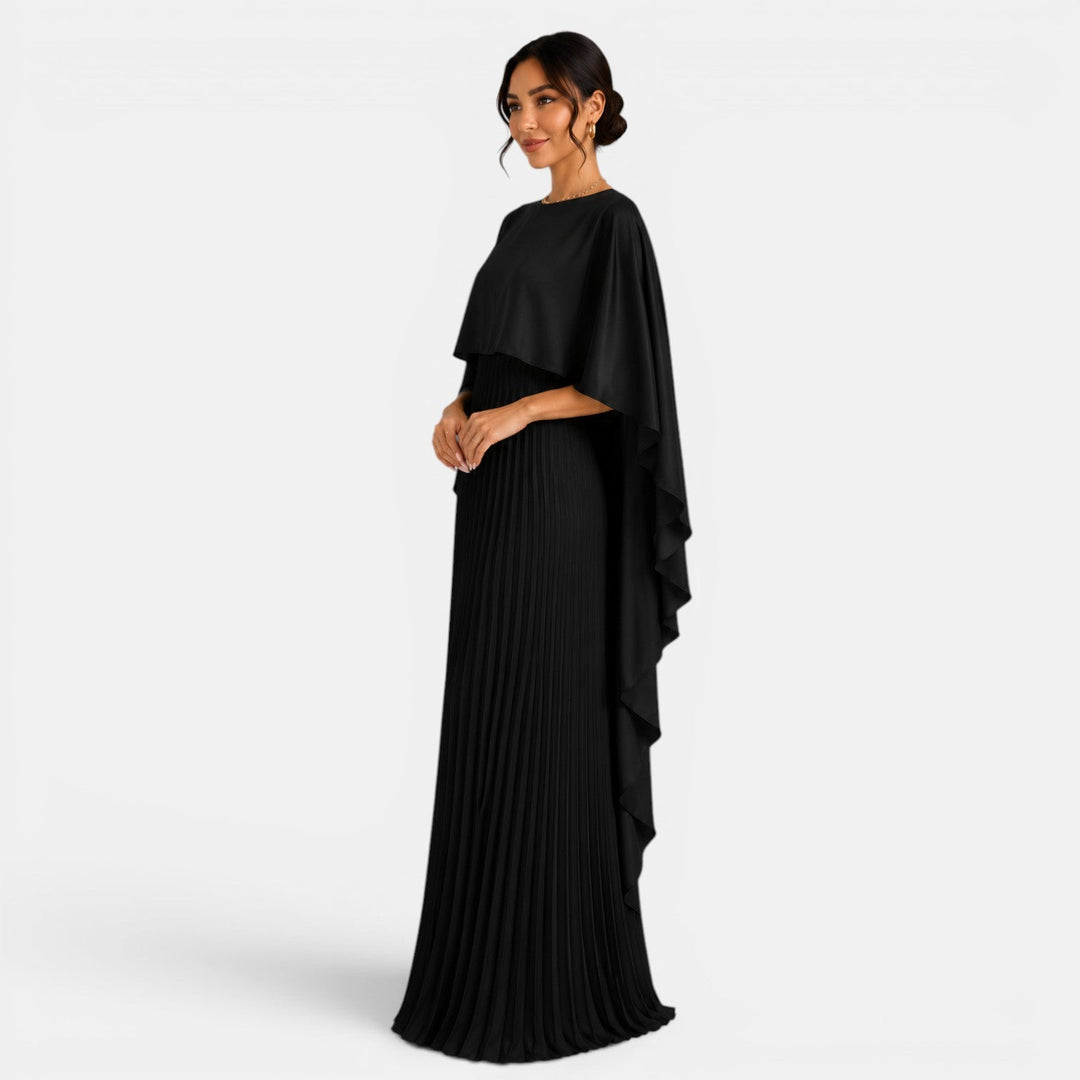 Vestido largo elegante con caída fluida y silueta asimétrica. Perfecto para mujer en cualquier ocasión especial.