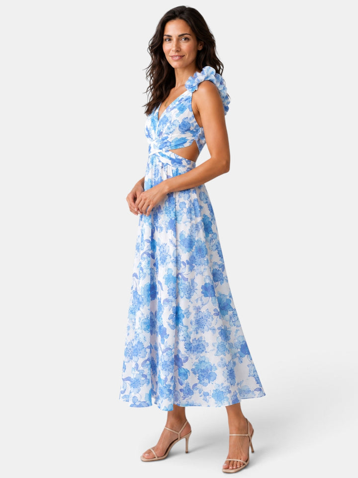 Vestido floral elegante para mujer, tejido fluido con estampado de flores, ideal para cóctel y eventos de día.