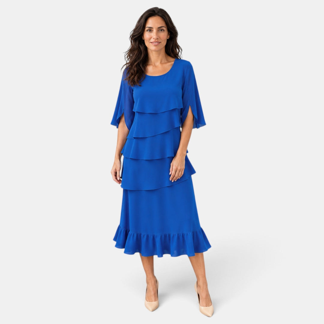 Vestido midi con diseño sofisticado, volantes fluidos y mangas abiertas. Moda femenina para ocasiones formales.