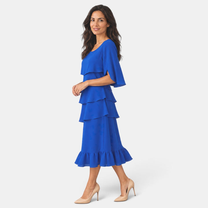 Vestido midi de fiesta para mujer, con volantes en el bajo y elegantes mangas abiertas. Estilo moderno y chic.