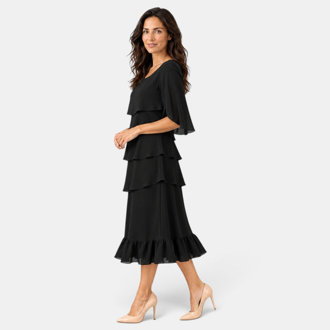 Vestido midi femenino con detalles de volantes en falda y mangas abiertas, perfecto para fiestas y graduaciones.