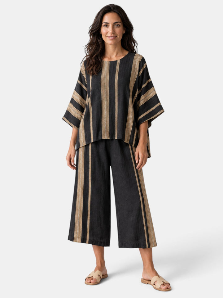 Conjunto mujer elegante de dos piezas: top asimétrico y pantalón culotte, ideal para primavera verano.