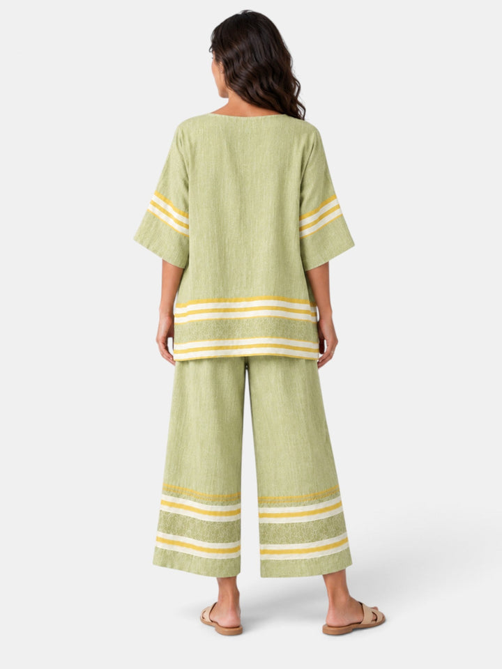Conjunto rayas mujer de dos piezas: top asimétrico y pantalón culotte, estilo moderno y cómodo para el verano.