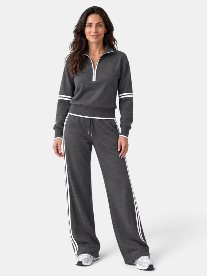Conjunto moderno de mujer, en tendencia. Cuello alto y pantalón ancho para un estilo chic y cómodo. Ropa elegante.