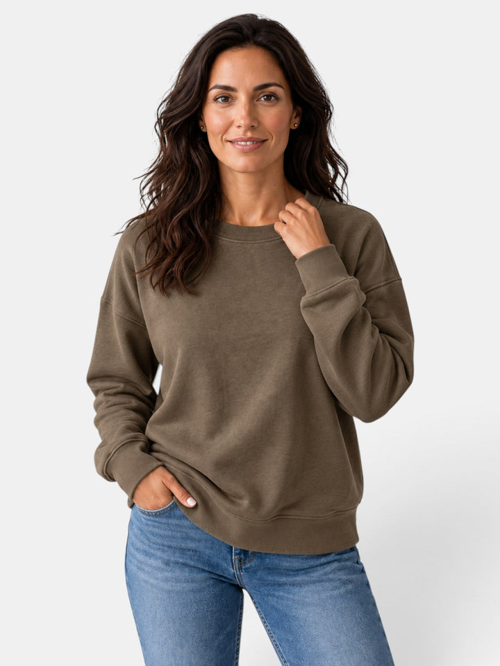 Sudadera versátil de mujer, cuello redondo y manga larga. Para un estilo casual en cualquier ocasión.