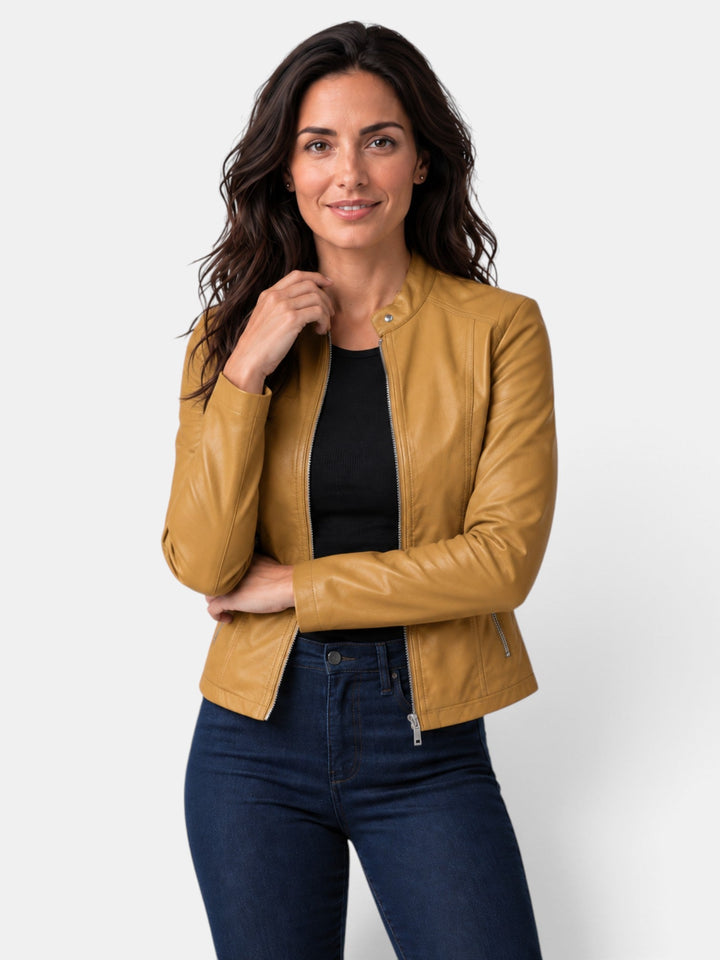 Abrigo entallado de mujer, cuello mao distintivo y cremallera, ideal para otoño y primavera.