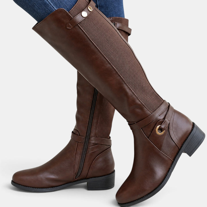 Botas altas ortopédicas de cuero para mujer con paneles elásticos ajustables. Ideales para comodidad y estilo casual de invierno.