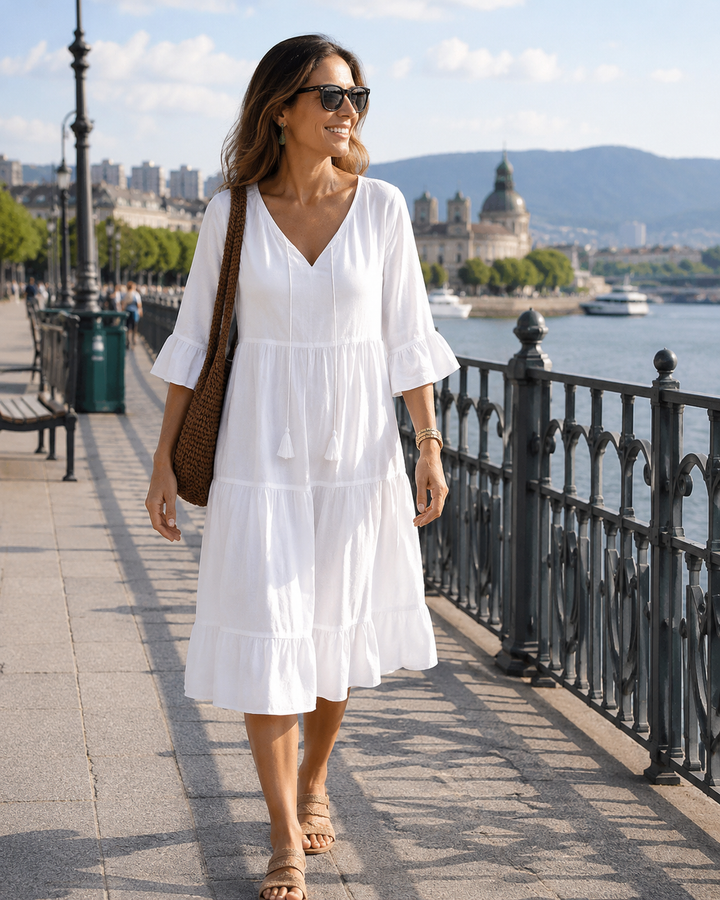 Vestido midi bohemio para mujer con escote V, ideal primavera/verano, estilo fluido y cómodo.