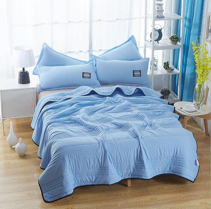 Suave manta de verano transpirable, de algodón y bambú, para un confort refrescante en tu dormitorio durante noches cálidas.