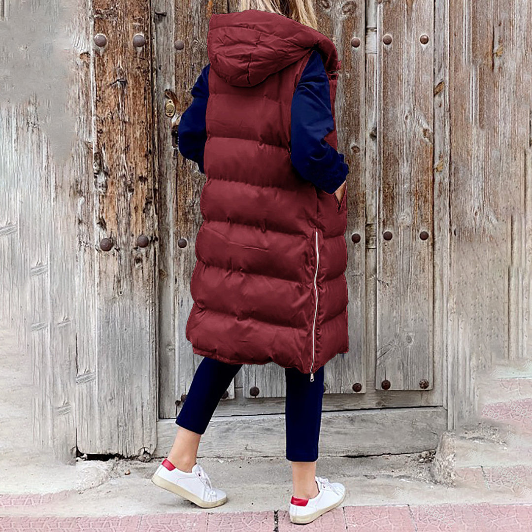 Chaleco largo moderno para mujer con capucha. Ideal para un look casual y cómodo, estilo versátil.