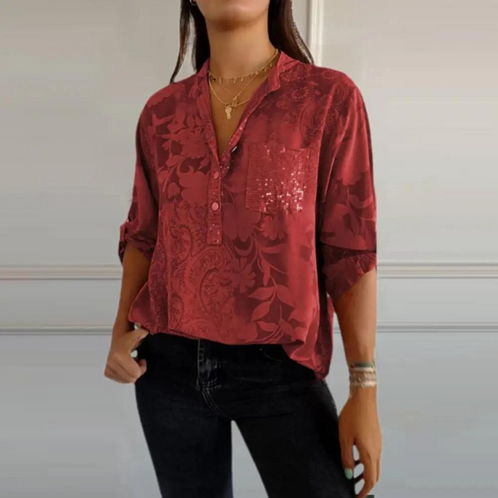 Blusa de moda femenina, estampado floral y manga larga. Detalle de bolsillo brillante. Perfecta primavera-verano.