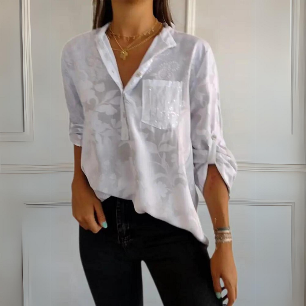 Blusa floral manga larga mujer con bolsillo brillante lentejuelas. Top casual elegante primavera-verano.