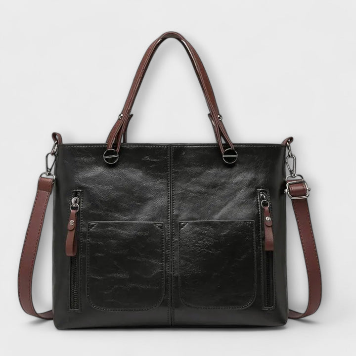Bolso tote marrón de piel sintética, versátil y con bolsillos, perfecto para mujer.