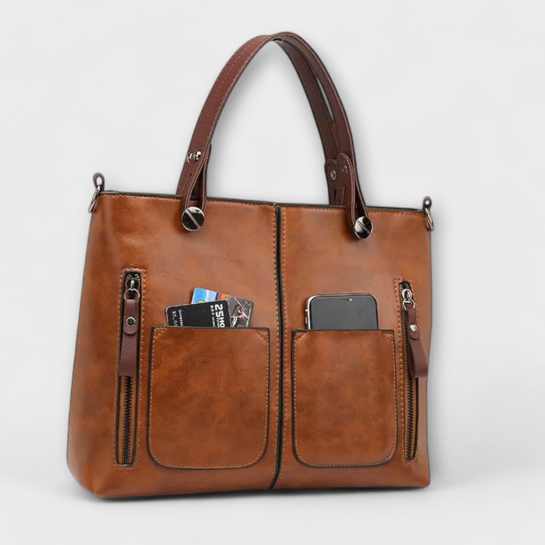 Bolso de mujer gris de piel sintética, espacioso y chic, ideal como bolso diario.