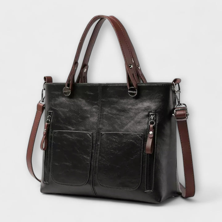Bolso diario versátil de piel sintética gris para mujer, con cremallera y estilo.