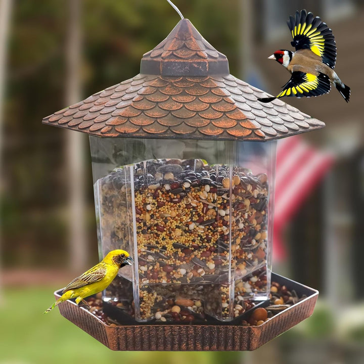 Comedero de aves colgante con elegante techo de cobre, ideal para jardín y exteriores. Resistente y ecológico.