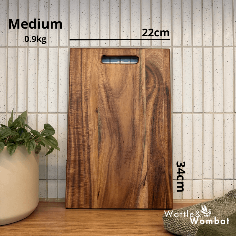 Tabla de cortar de acacia grande, perfecta para picar y preparar alimentos en tu cocina.