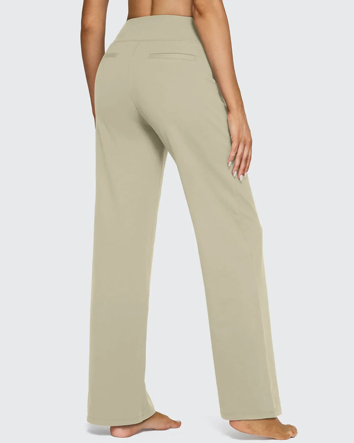 Pantalones de mujer tiro alto, pierna ancha, con bolsillos, para un estilo relajado pero elegante.