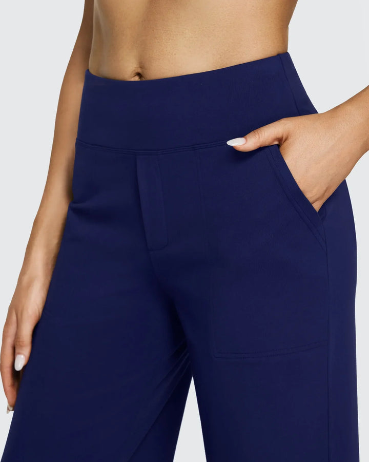 Pantalones de mujer tiro alto, pierna ancha, con bolsillos, para un estilo elegante y sin complicaciones.