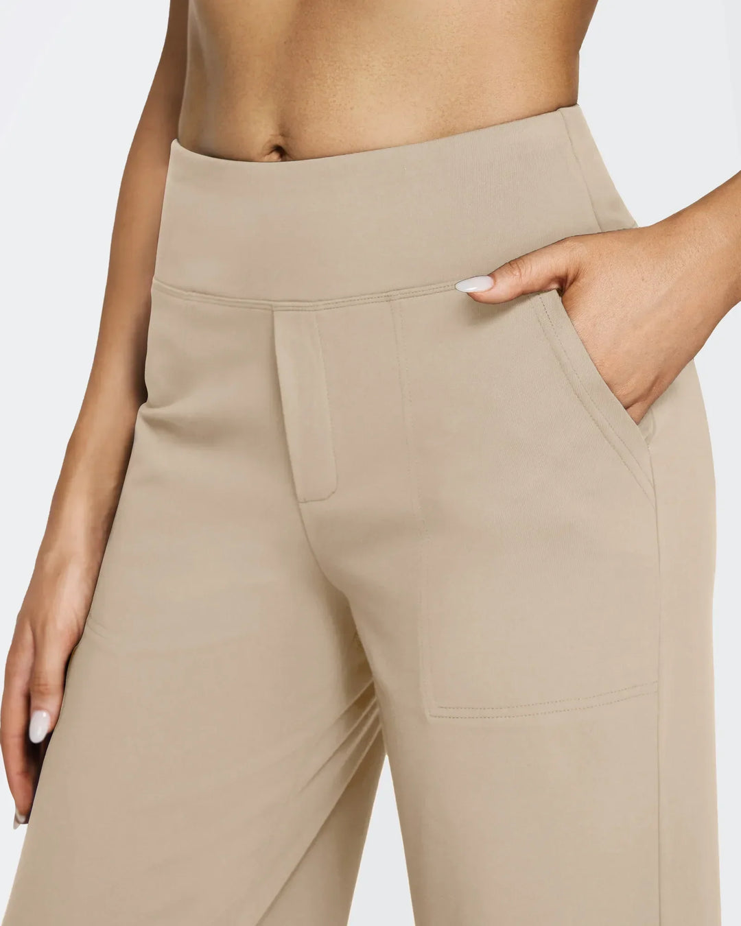 Ropa femenina: pantalones tiro alto, pierna ancha, bolsillos, para un look pulcro y sofisticado.