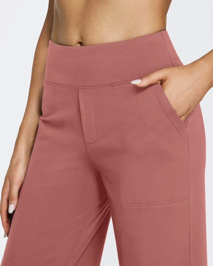 Pantalones de mujer tiro alto, pierna ancha, con bolsillos, para un estilo chic y relajado a la vez.