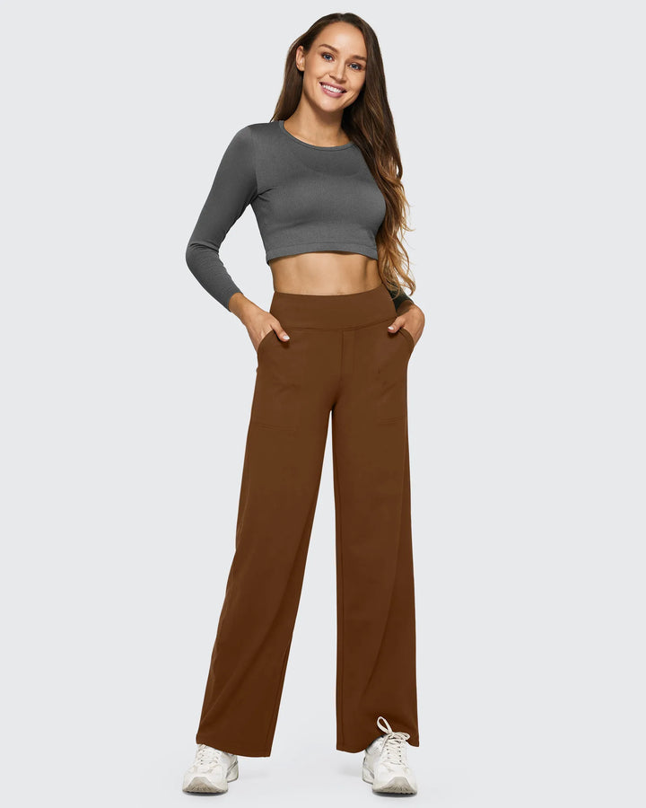 Pantalón de mujer, tiro alto, pierna ancha, bolsillos, que aporta un toque de sofisticación a tu atuendo diario.