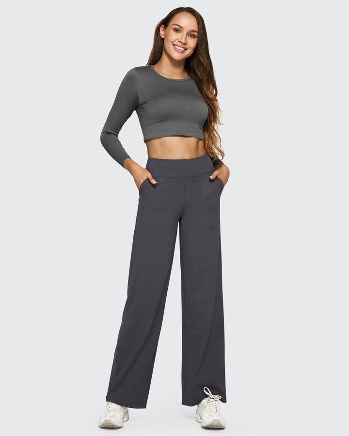 Ropa femenina: pantalones tiro alto, pierna ancha, bolsillos, para un look que irradia confianza y estilo.