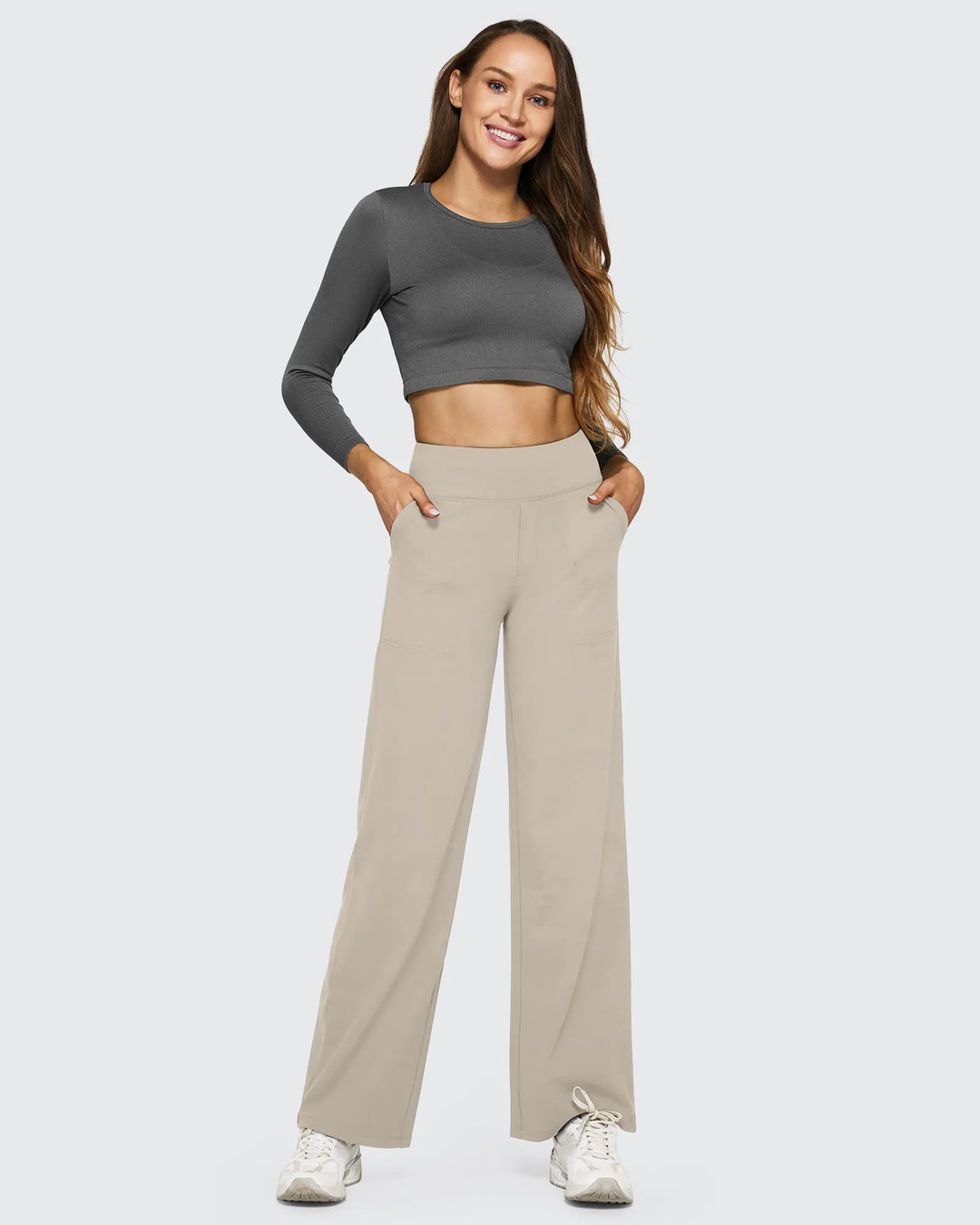 Pantalones de mujer con bolsillos, tiro alto y pierna ancha, versátiles para un look relajado y con encanto.