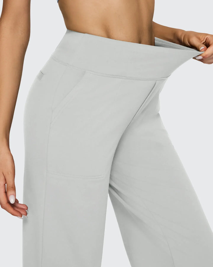 Pantalones de mujer, tiro alto, pierna ancha, bolsillos, perfectos para un estilo minimalista.