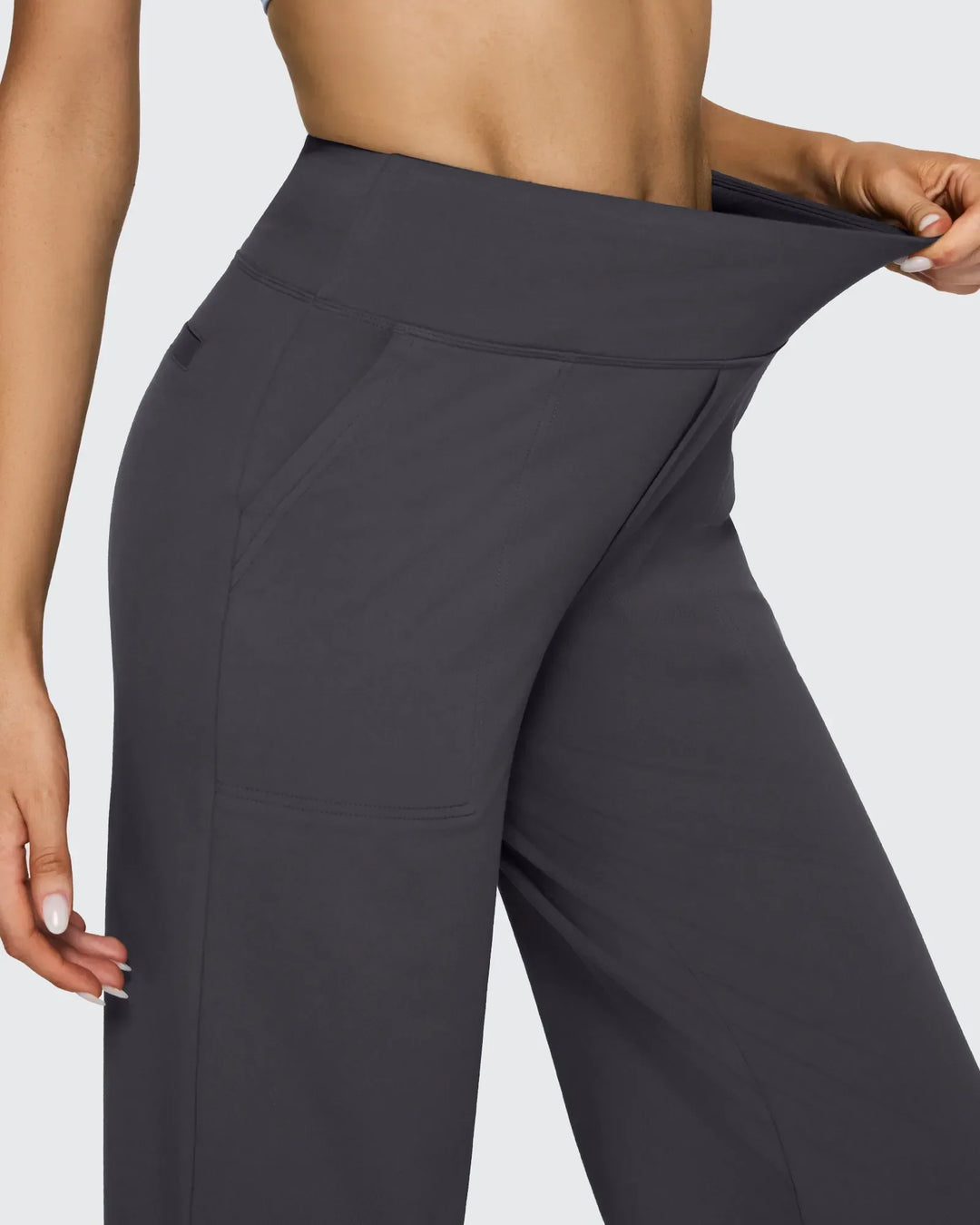 Pantalones de mujer con bolsillos funcionales, tiro alto y pierna ancha, comodidad y estilo.