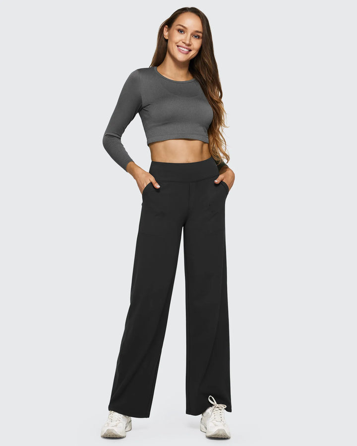 Pantalones de mujer, tiro alto, pierna ancha, bolsillos, que te permiten estar cómoda y chic.