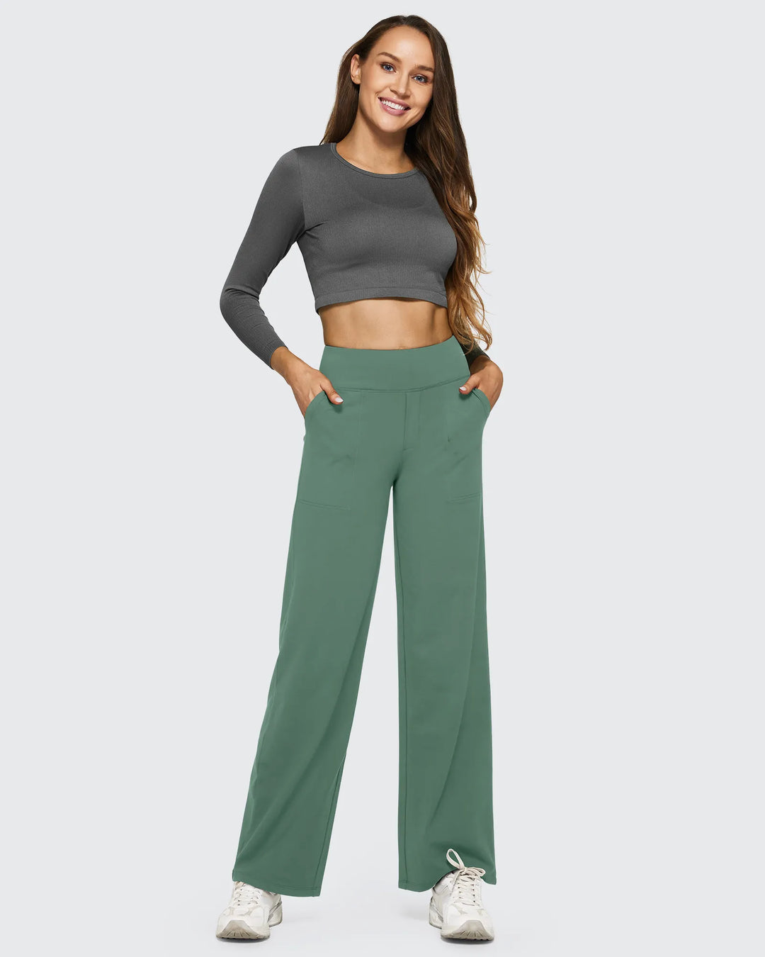 Pantalones de mujer con bolsillos, tiro alto y pierna ancha, versátiles para cualquier clima.