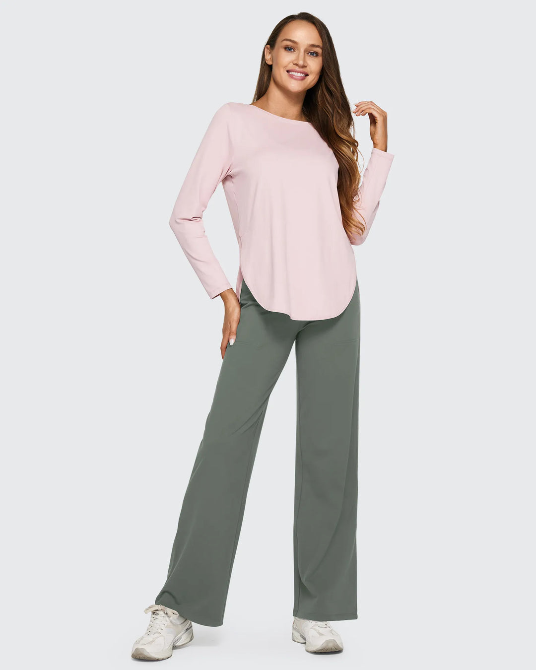 Pantalones de mujer tiro alto pierna ancha con bolsillos, ideales para un look minimalista.