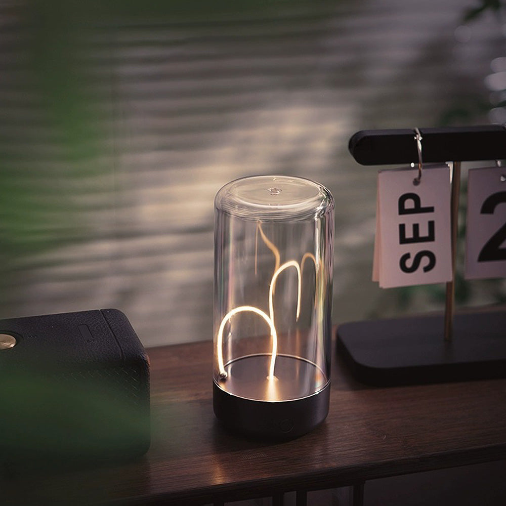 Lámpara de mesa LED inalámbrica moderna, diseño cilíndrico para iluminación y decoración de ambiente.