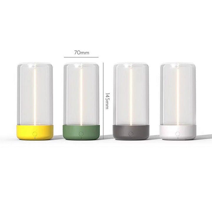Crea ambiente con esta lámpara LED inalámbrica, diseño cilíndrico y luz acogedora.