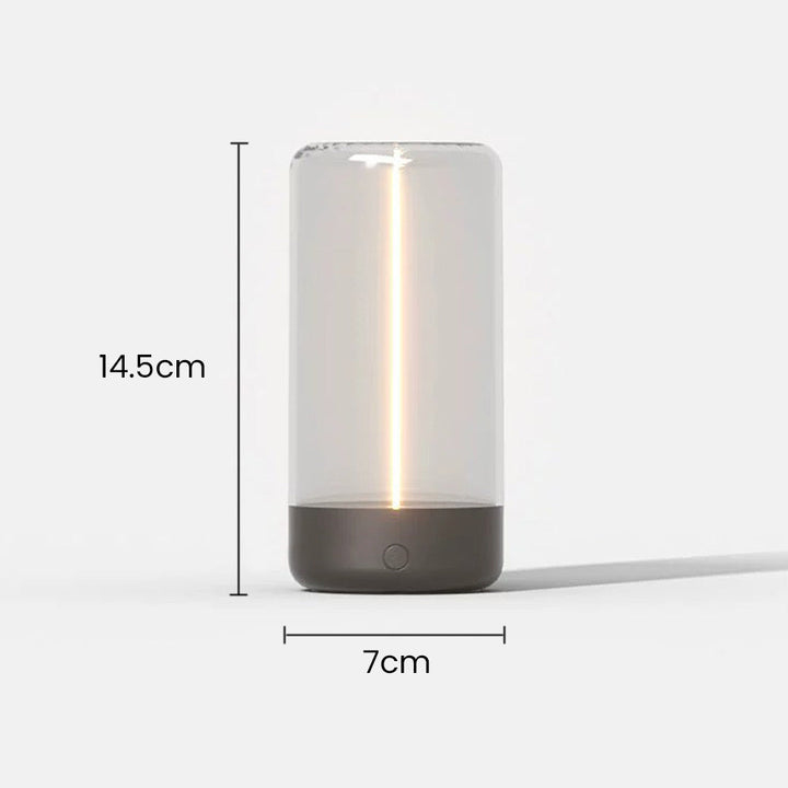 Lámpara de mesa LED, cilíndrica, inalámbrica, con iluminación moderna y práctica.