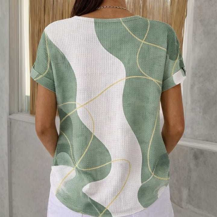 Blusa de moda con bloques de color para mujer. Estilo fresco y casual, perfecta para el verano.