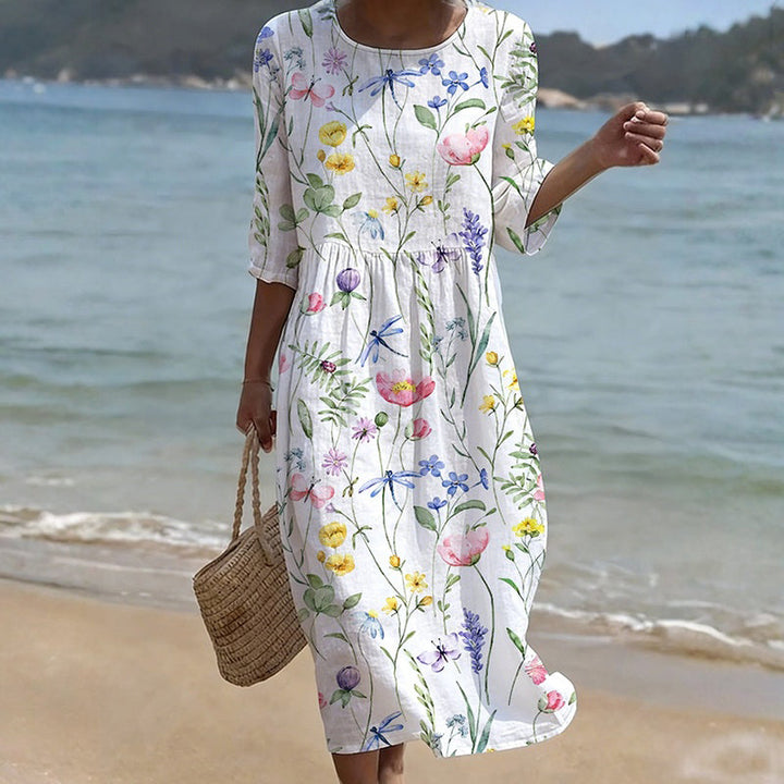 Vestido midi floral para mujer, mangas 3/4. Un diseño cómodo y elegante, perfecto para verano o primavera. Moda femenina.