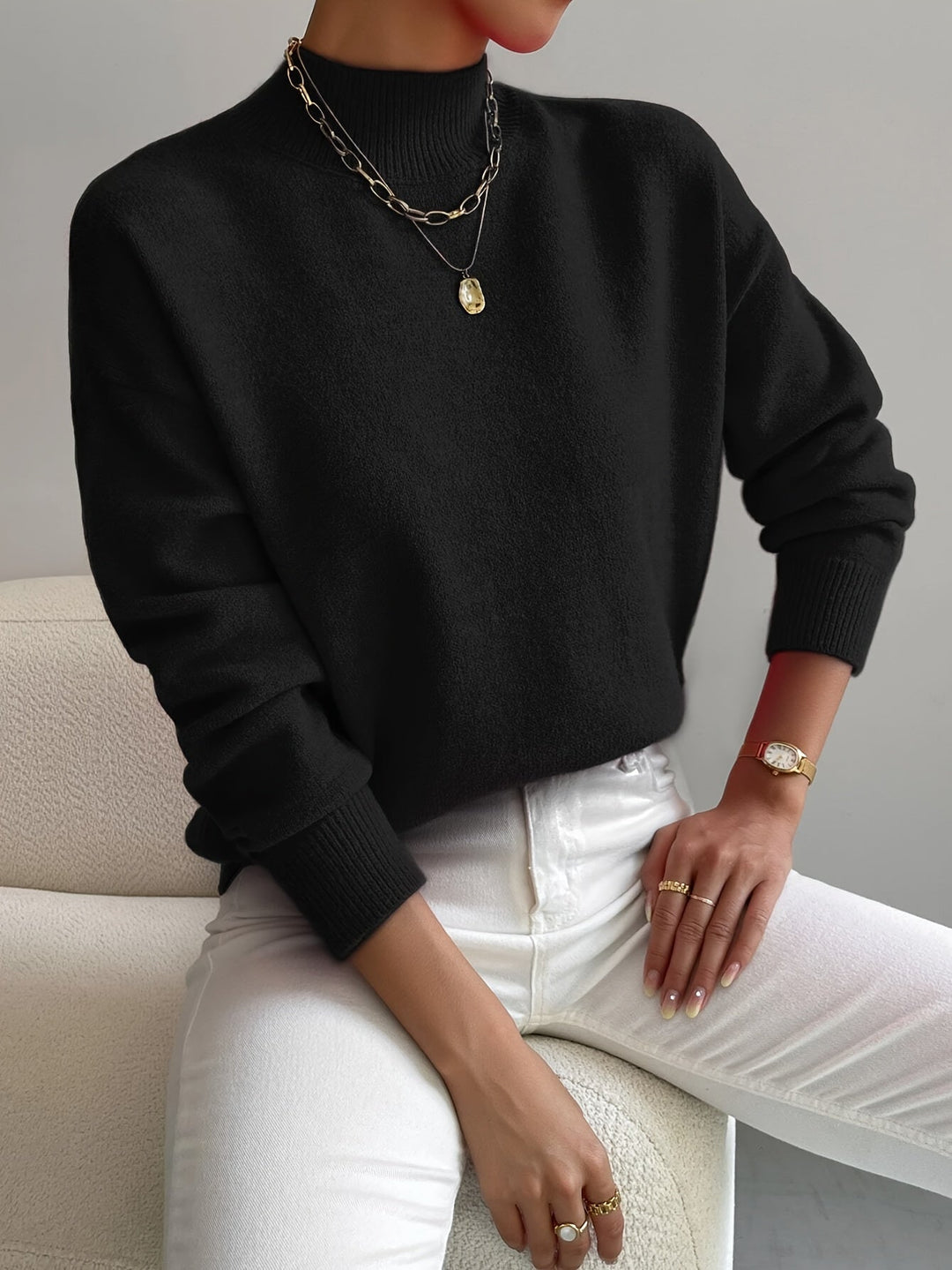 Jersey de punto grueso para mujer, cuello alto, manga larga, ideal para un estilo relajado y casual de invierno.