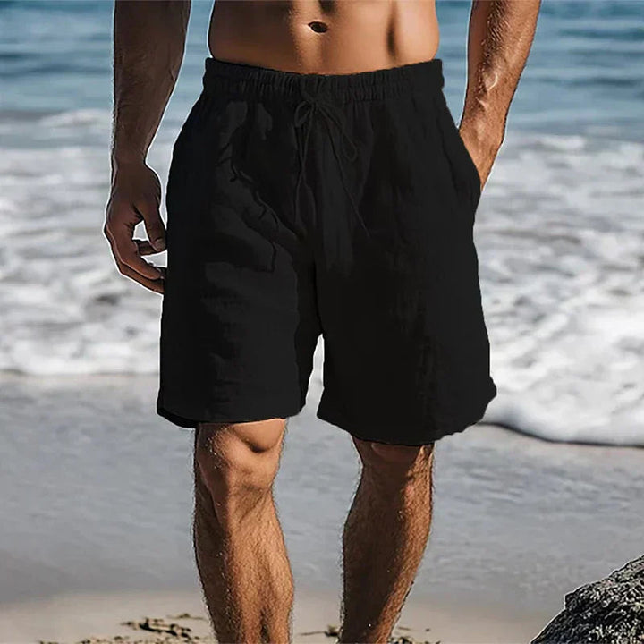 Pantalones cortos de lino para hombre, beige, con cintura ajustable. Ideales para verano y playa, estilo casual.