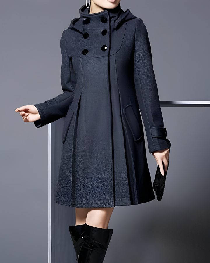 Abrigo largo elegante para mujer, estilo clásico de invierno. Diseño cálido con botones y bolsillos, ideal para outfit formal.