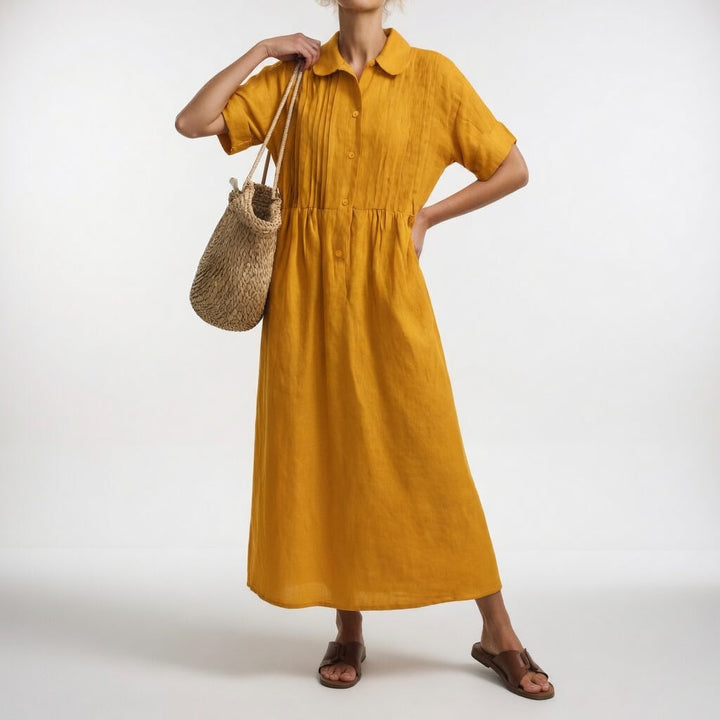 Vestido midi camisero fluido para mujer. Elegante, casual y transpirable. Perfecto para el verano y la playa.