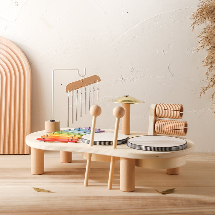 Mesa musical de madera para niños con xilófono, tambor y platillos. Juguete educativo infantil para desarrollo temprano.