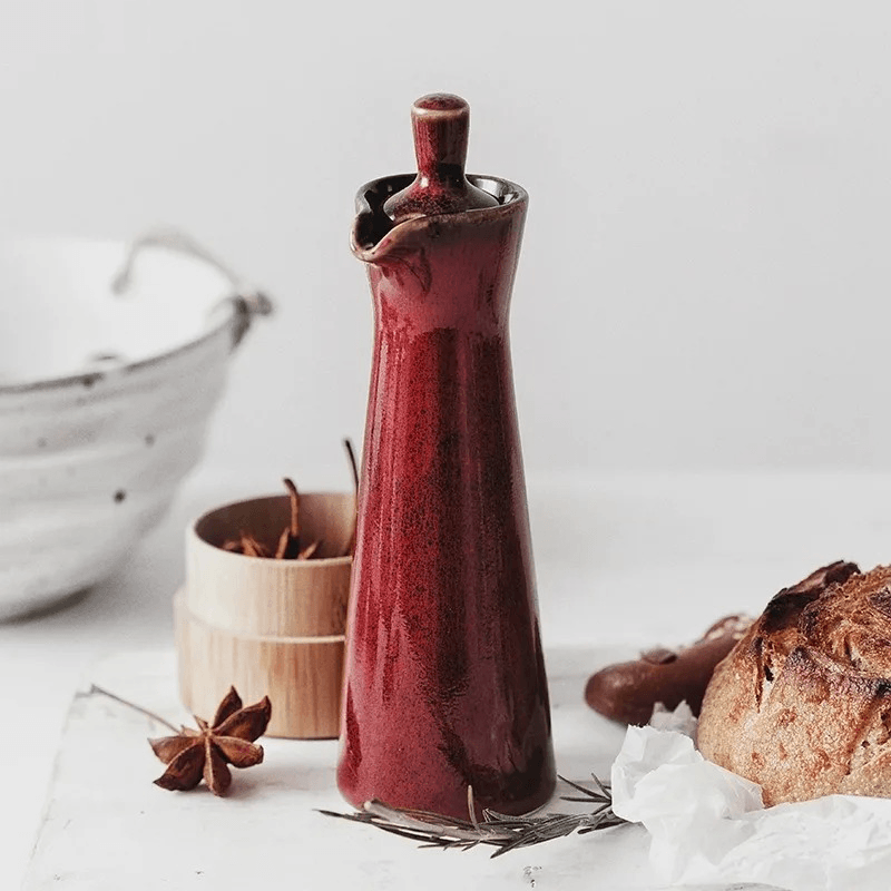 Botella vertedora artesanal para aderezos, diseño exclusivo, aceite y vinagre gourmet.